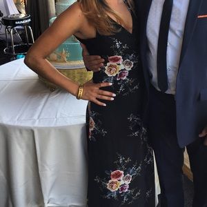 Black floral boohoo wrap dress with ruffle skirt